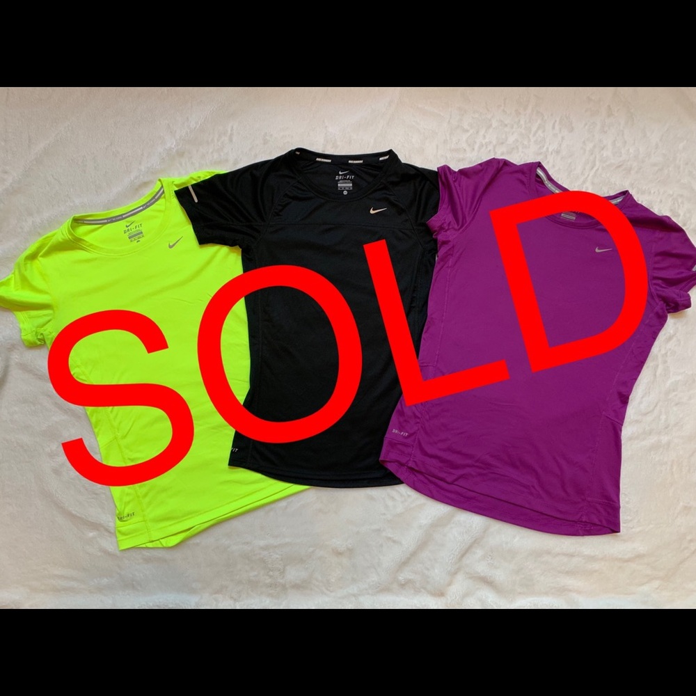 3 Nike women’s miler tops